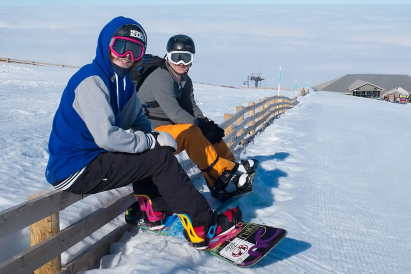 Snowboarders ready to hit the park