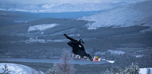 Snowboarder doing jump