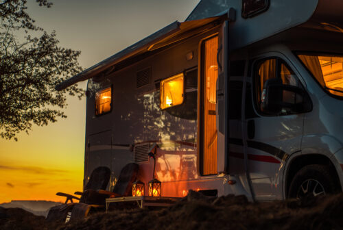 Motorhome and Chairs at Sunset