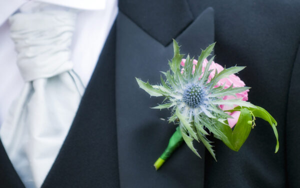Groom with thistle in button hole