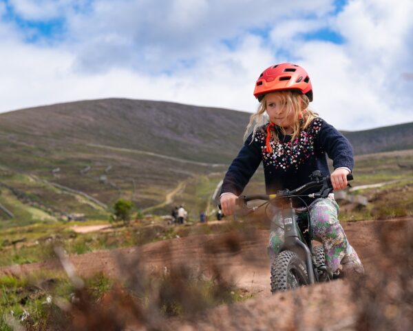 Young girl on Cairngorm Mountain bike trails