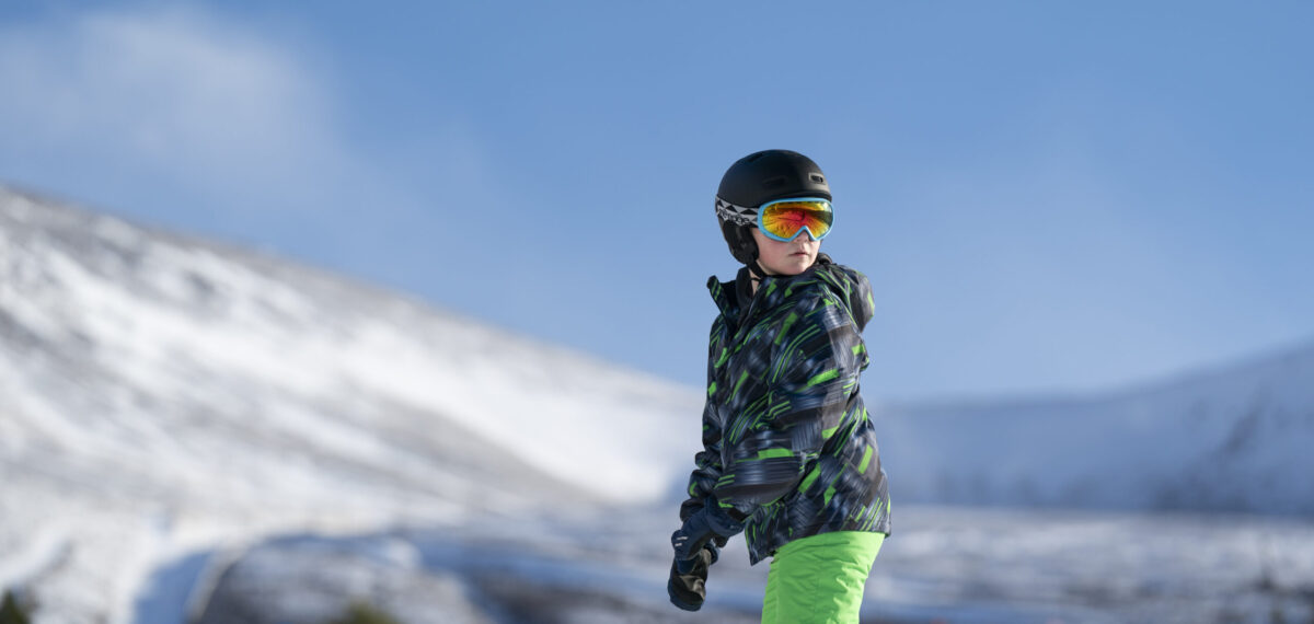 Snowboarder on beginners slope at Cairngorm Mountain