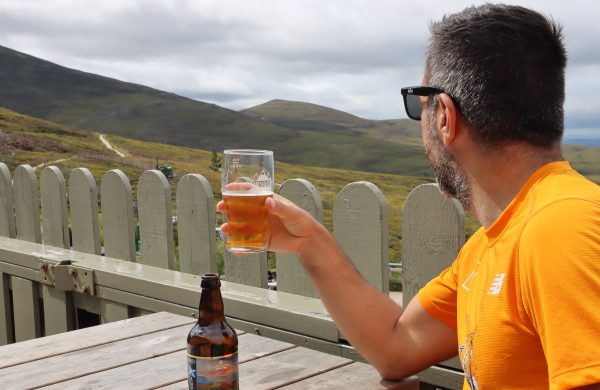 Man drinking a beer on the terrace